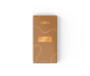 Chocolate bar featuring a spiced speculoos biscuit cream filling with biscuit crumbs, surrounded by broken pieces and whole biscuits.