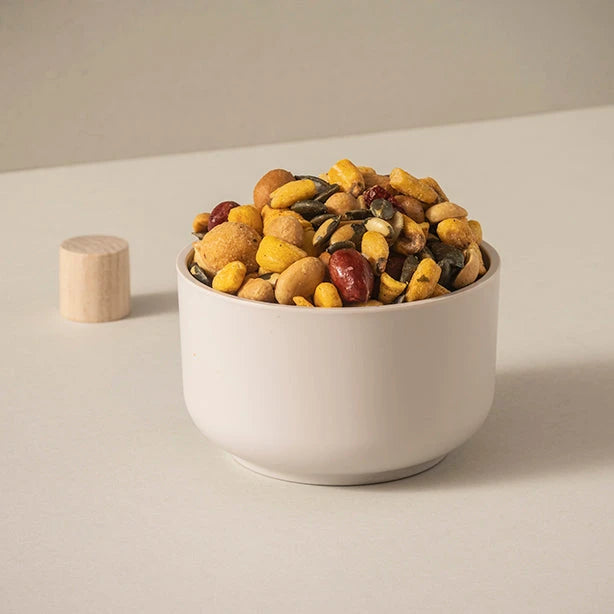 Oriental snack mix with peanuts, crackers, corn chips, and rice snacks